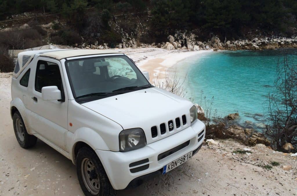 Suzuki Jimny in front of Marble Beach Thassos Greece 