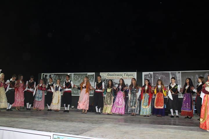 dancers in traditional greek costumes 