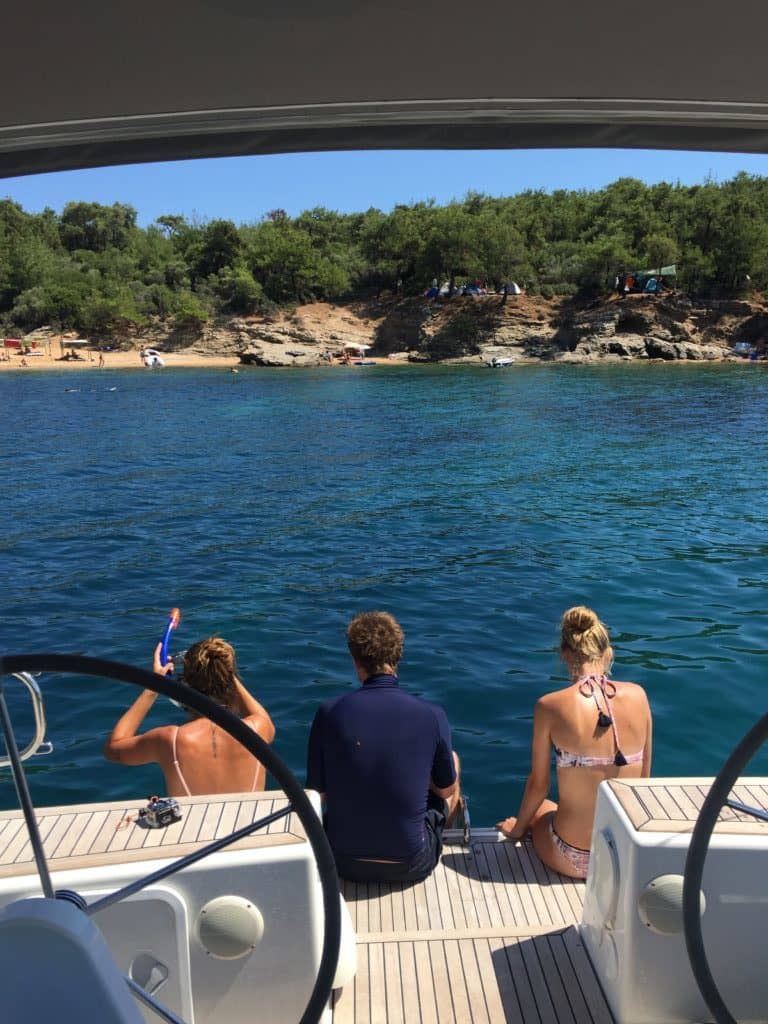 tourists at Salonikios Beach ready to dive