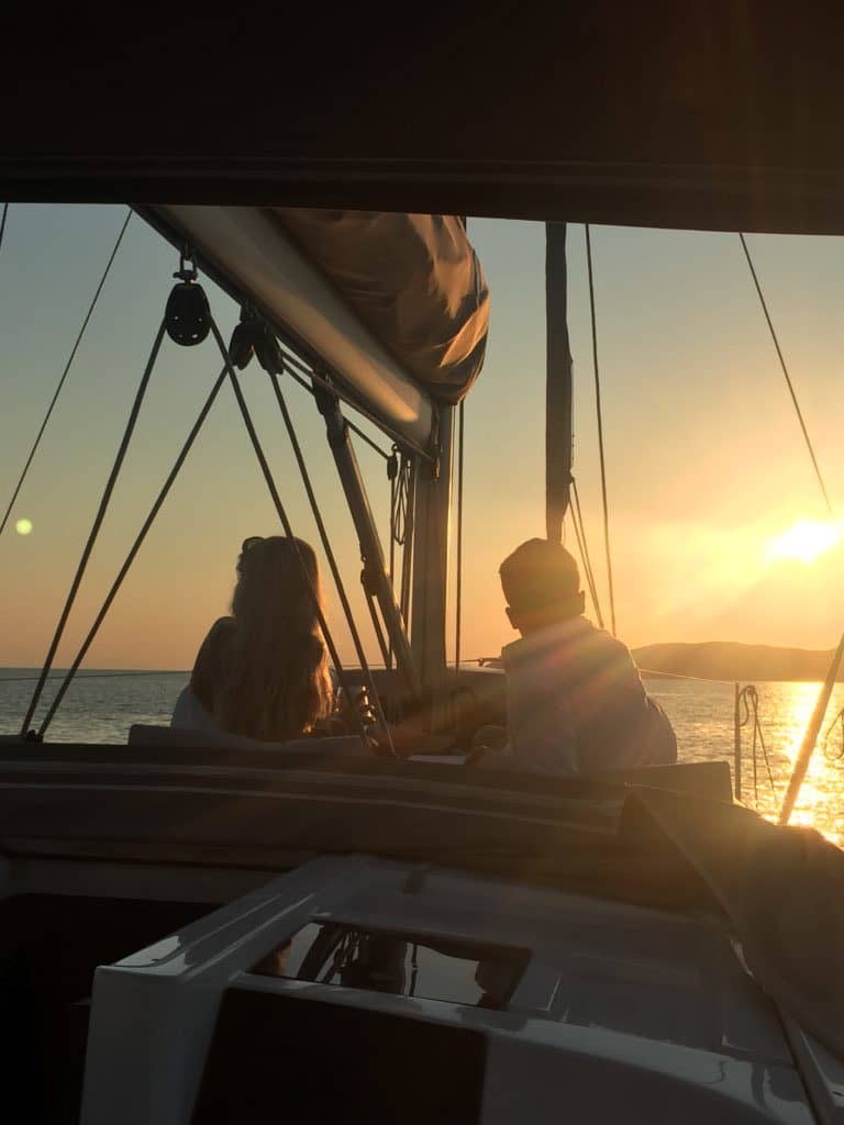 Romantic couple and sunset at Aeolus Yacht 