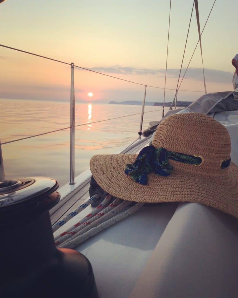 sunset at Aeolus yacht and hat 