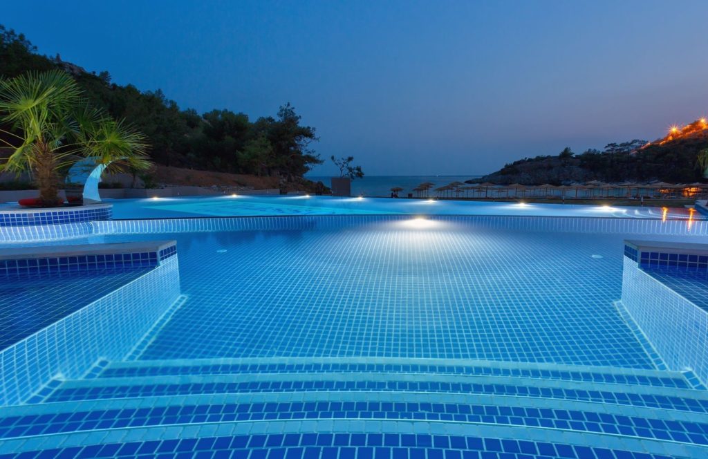 thassos grand resort pool by night