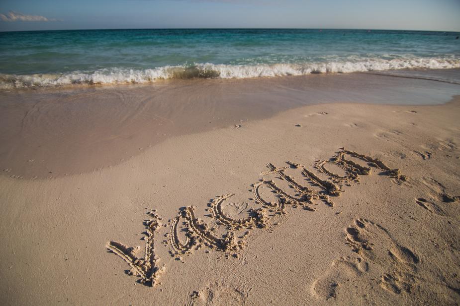 vacation-written-on-beach